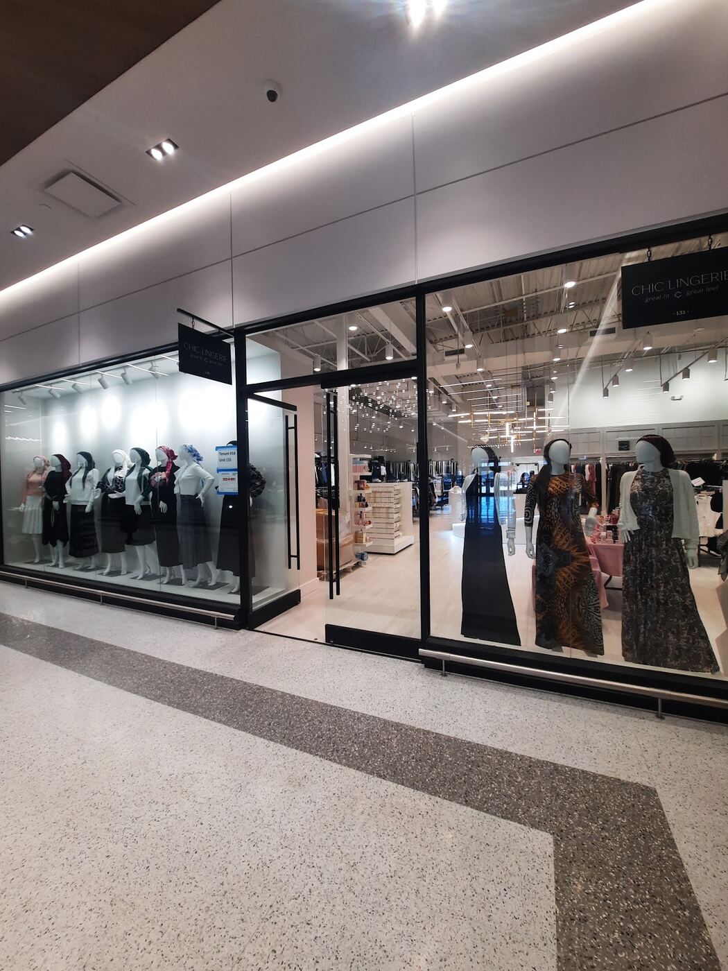 Modest robes and loungewear on mannequins in the window