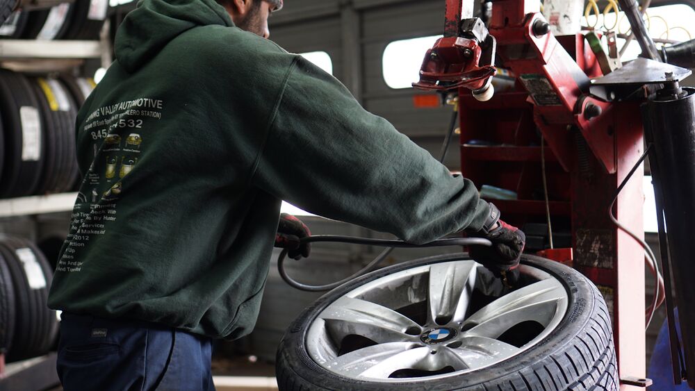 Mounting a tire at Jerusalem Auto Repair