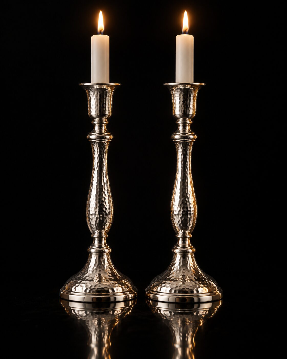Hand-hammered sterling silver Shabbos candlesticks