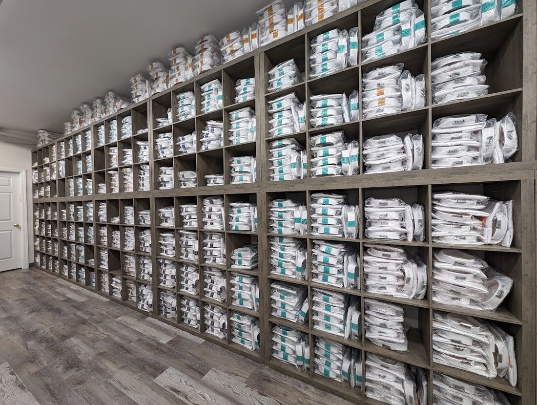 Wall of folded shirts at Malbish