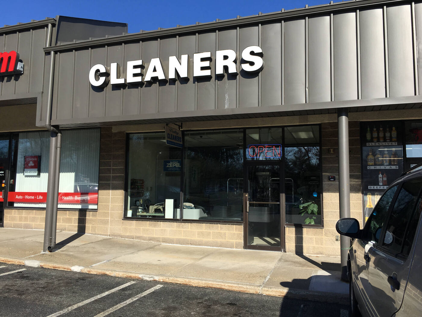 The Valley Cleaners storefront at Spring Valley Marketplace